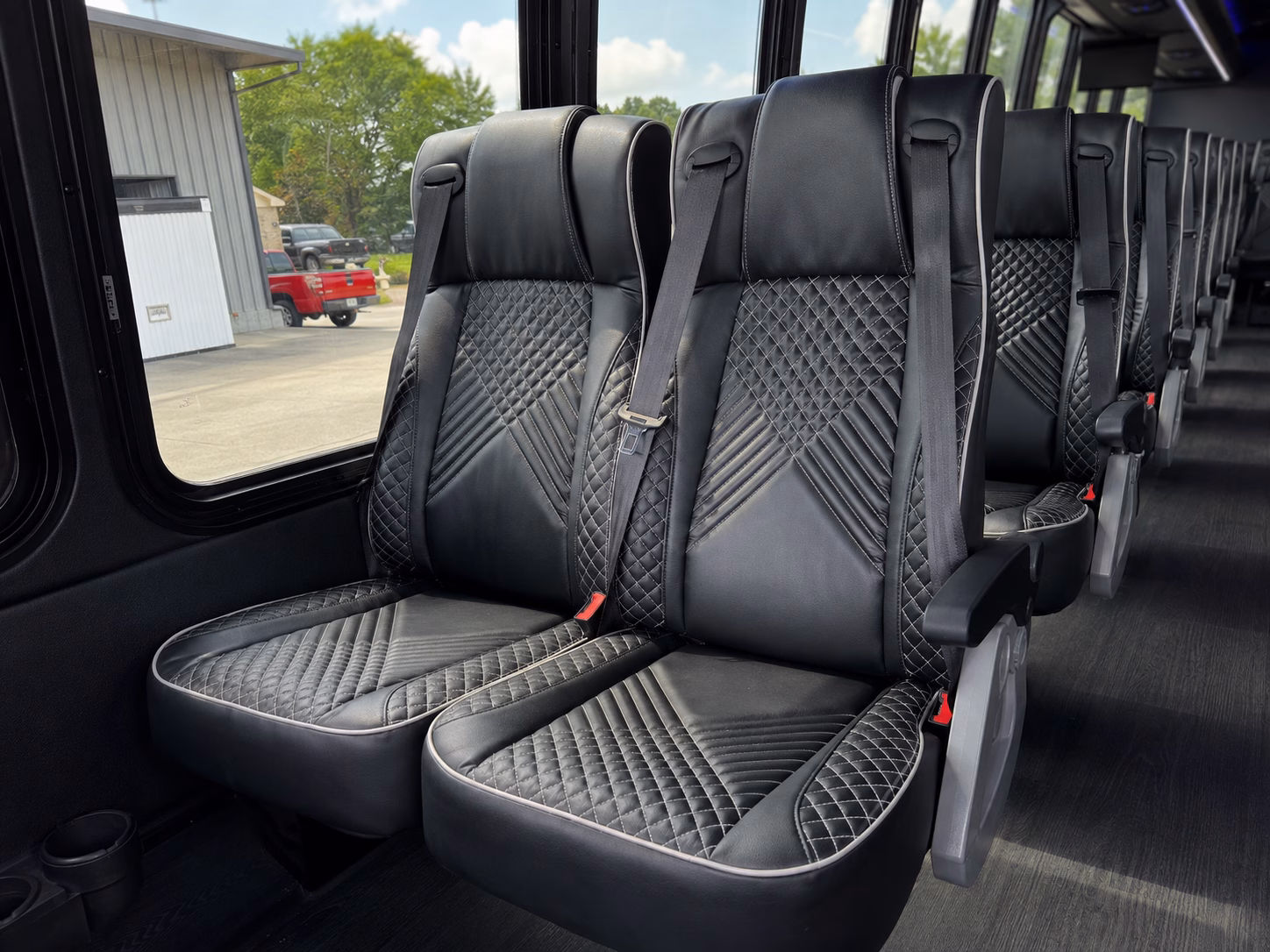 call to book a bus to holy field vineyard winery in basehor